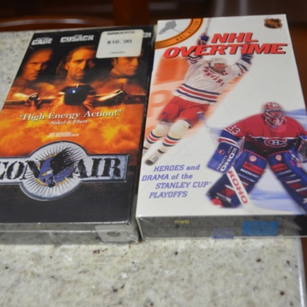 2 VHS Factory Sealed  CON AIR  and  NHL OVERTIME – Heroes and Drama Stanley Cup